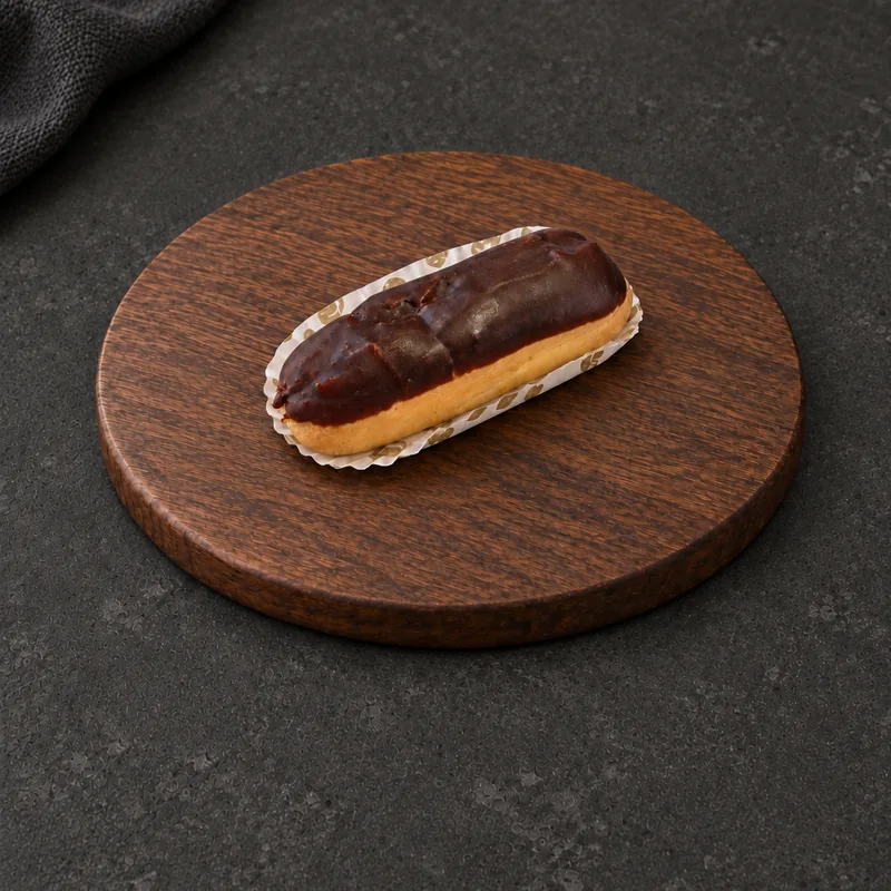 Oblong Chocolate Éclair with a glossy dark coating