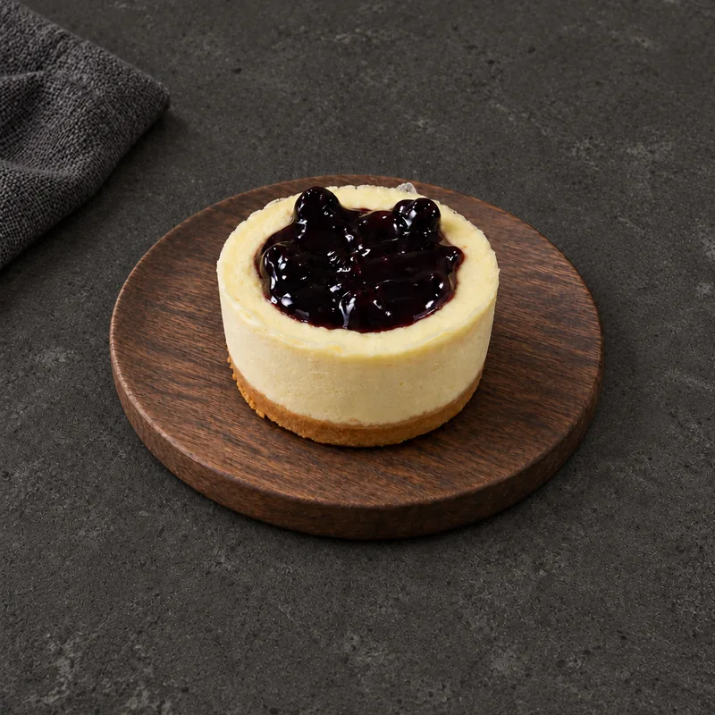 Blueberry Mini Cheesecake with a glossy dark topping