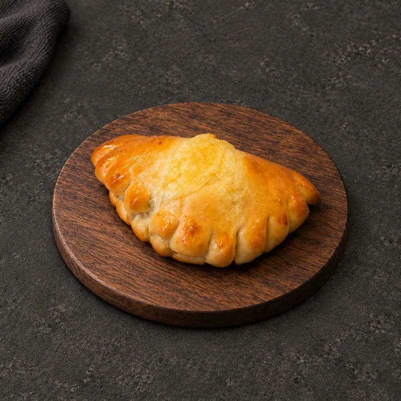 Golden half-moon Chicken Bread with a crimped edge